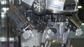Nissan GT-R Transformers Toy Poses Next To Real Nissan GT-R